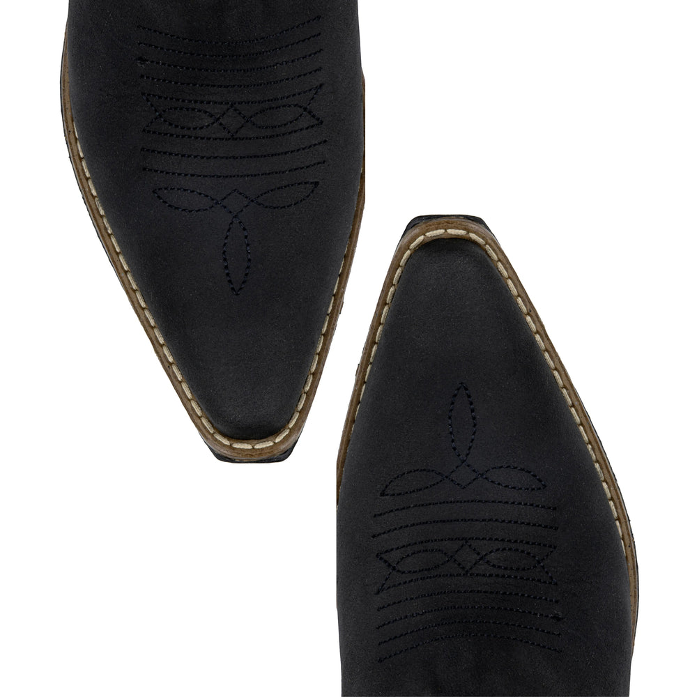 Botas vaqueras de piel negra Justin Boots México con bordado artesanal y punta afilada. Diseño moderno y cómodo para mujer.