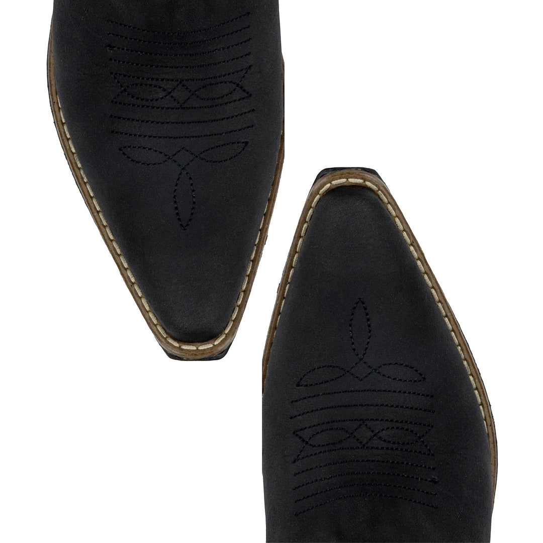 Botas vaqueras de piel negra Justin Boots México con bordado artesanal y punta afilada. Diseño moderno y cómodo para mujer.