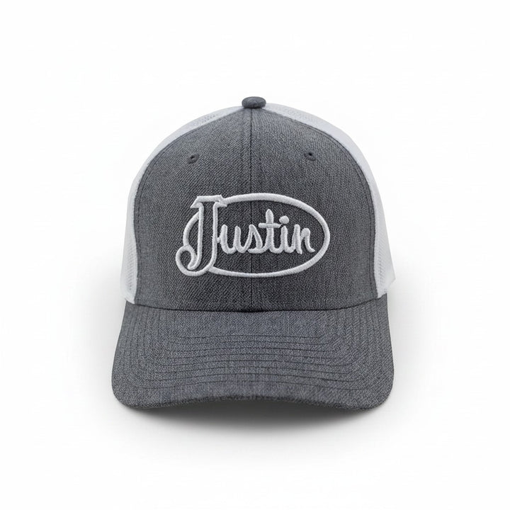 Justin Boots México gray trucker cap with white mesh back and embroidered logo. Adjustable snapback closure.